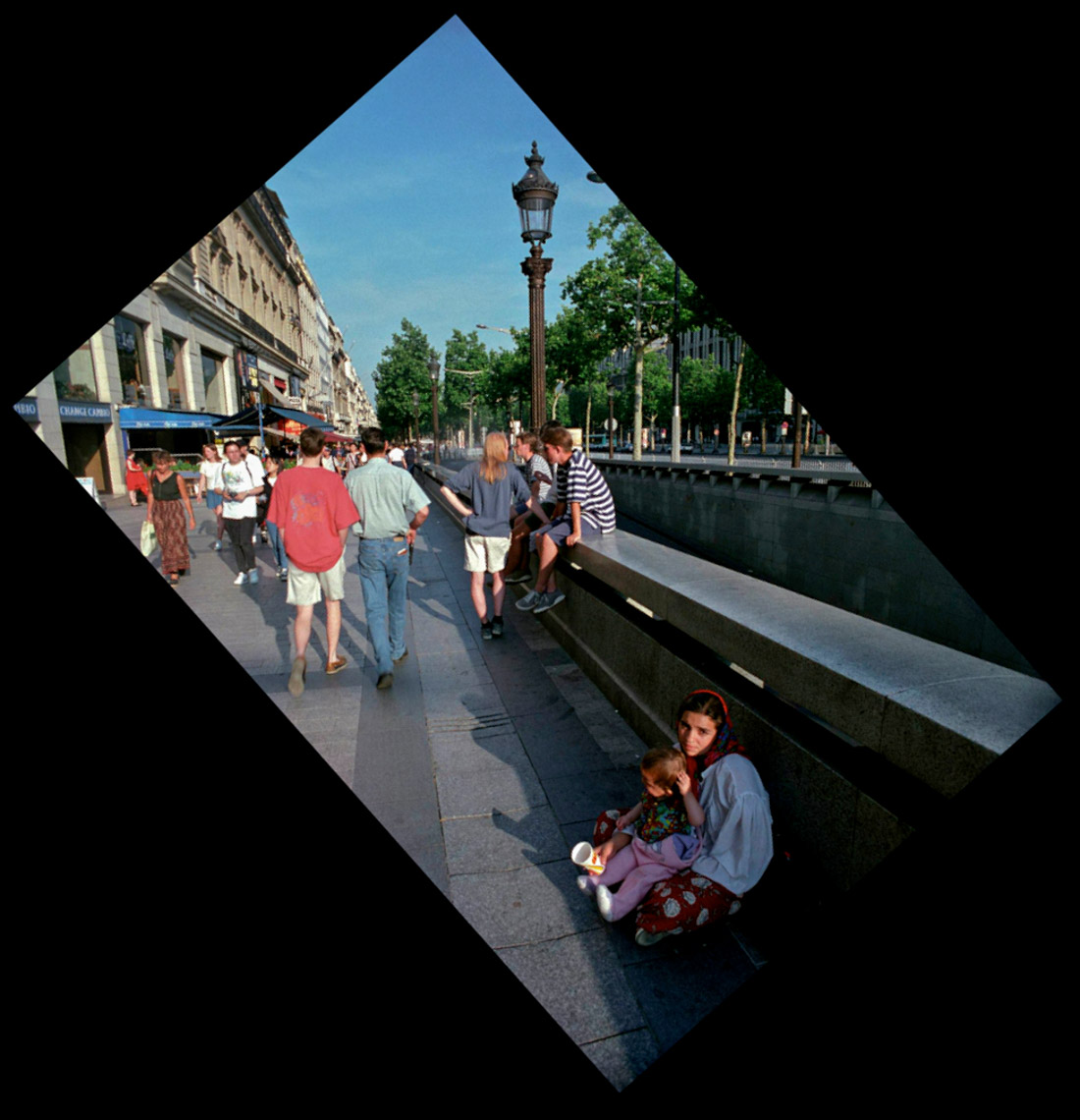 "Gypsy with Child, Champs-Elysées",  1997, © Lewis Rogers, Contemporary Art Photography,  Contemporary Photography, Color Film Photography, 20th Century Photography, Photo-Sequence, Diptych Photography, Polyptych Photography,Triptych Photography, Postmodern Photography, 1990’s Photography, Constructivism Photography